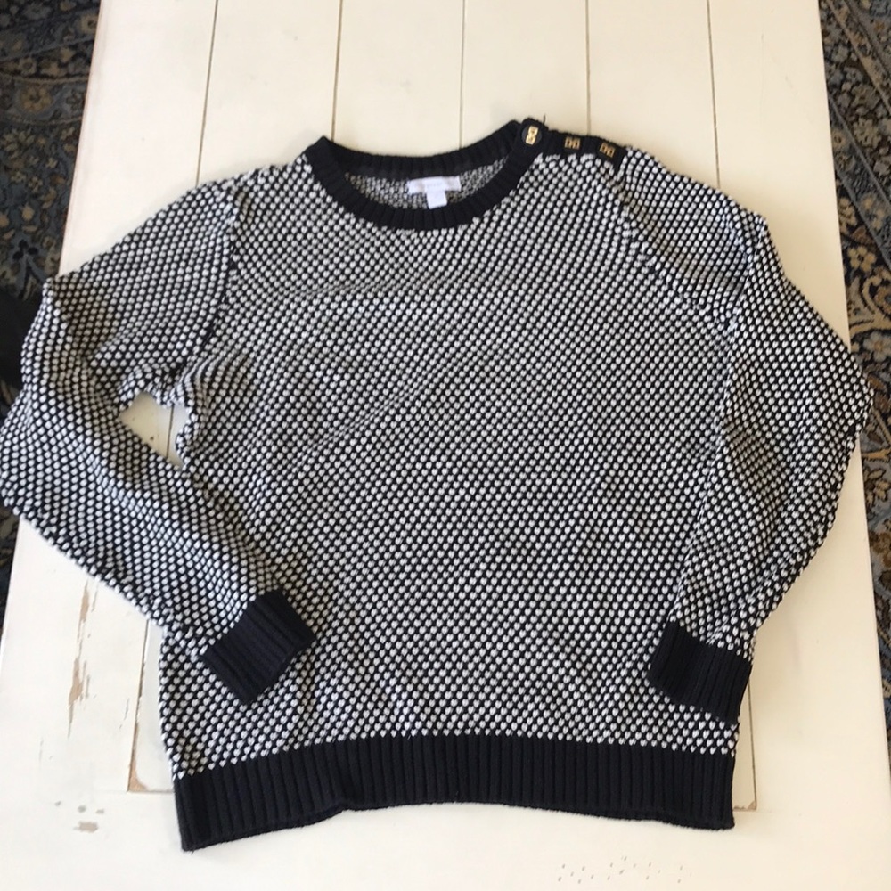White and black sweater